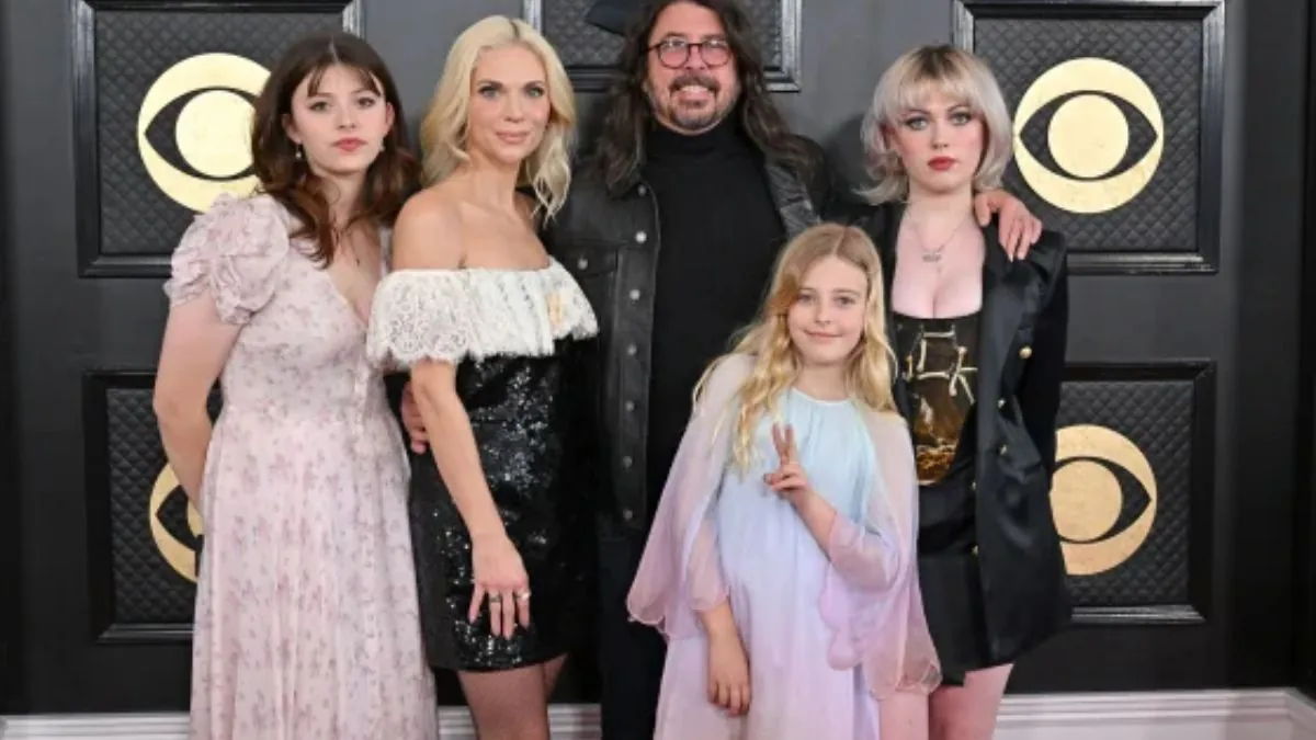 Dave Grohl attends the 2023 Grammys with wife Jordyn Blum and daughters Harper Willow Grohl, Ophelia Saint Grohl and Violet Maye Grohl on Feb. 5, 2023