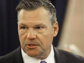 AG Kobach signs on to challenge over Mass. student's controversial shirt