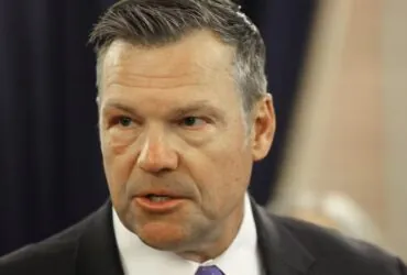 AG Kobach signs on to challenge over Mass. student's controversial shirt