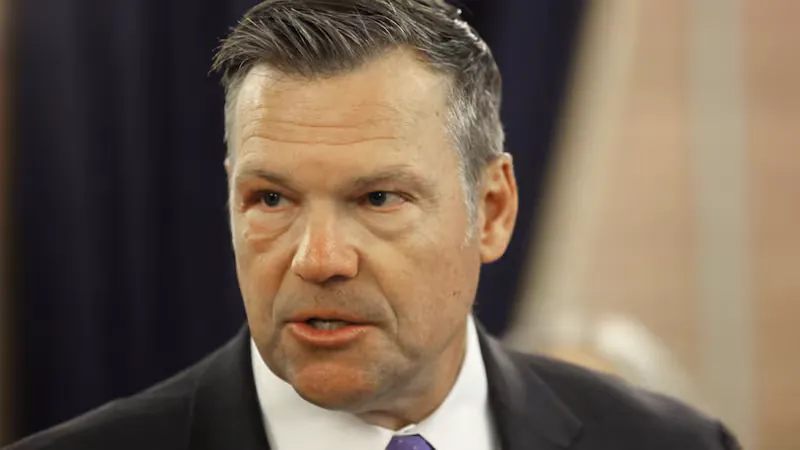 AG Kobach signs on to challenge over Mass. student's controversial shirt